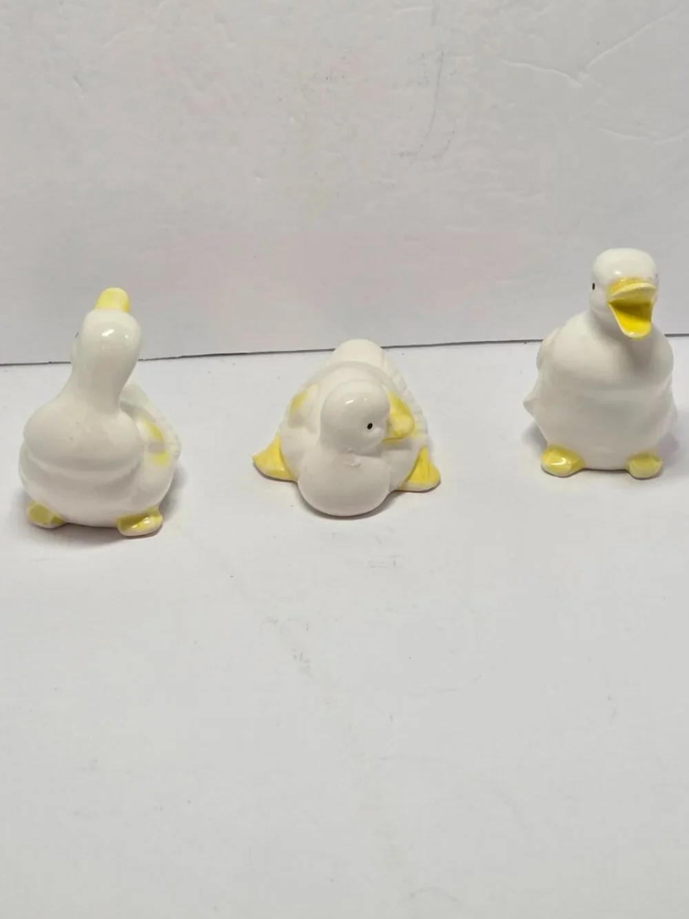 Set of 3 Ceramic Duck Figurines 4in Long 3in Tall White/Yellow Glossy